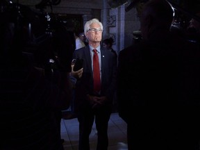 Canada has not invited the United States to an upcoming meeting aimed at saving the international trading system because it doesn't share the views of the 13 invited countries, says the new Canadian trade minister. Jim Carr, then-Minister of Natural Resources, speaks to reporters following Question Period in the House of Commons on Parliament Hill in Ottawa on Tuesday, May 29, 2018.