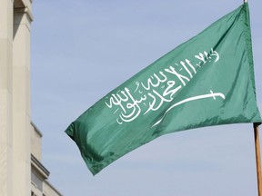 Saudi Arabia's flag is seen at the Pentagon, Thursday, Sept. 27, 2012. The real reason the Liberal government hasn't been able to re-establish relations with Iran is due to a "stupid" Canadian law it supported allowing the seizure of Iranian assets, says Canada's recently expelled ambassador to Saudi Arabia.