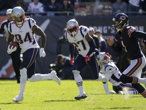 New England Patriots' Cordarrelle Patterson (84) runs to the end zone for a touchdown on a kickoff return during the first half of an NFL football game against the Chicago Bears Sunday, Oct. 21, 2018, in Chicago.