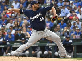 Milwaukee Brewers starting pitcher Jhoulys Chacin (45) delivers during the first inning of a tiebreaker baseball game against the Chicago Cubs on Monday, Oct. 1, 2018, in Chicago.