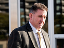 Former gymnastics coach Dave Brubaker leaves the court house in Sarnia, Ont., on Oct. 23, 2018 following the first day of testimony in his sexual assault trial.