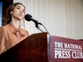 Nadia Murad, co-recipient of the 2018 Nobel Peace Prize, speaks at a news conference at the National Press Club, Monday, Oct. 8, 2018, in Washington.