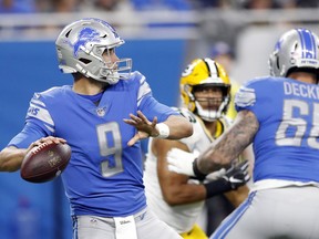 Detroit Lions quarterback Matthew Stafford prepares to throw during the first half of an NFL football game against the Green Bay Packers, Sunday, Oct. 7, 2018, in Detroit.