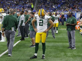 Green Bay Packers kicker Mason Crosby stands in the bench area after missing a field goal during the second half of an NFL football game against the Detroit Lions, Sunday, Oct. 7, 2018, in Detroit.