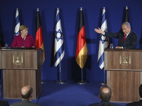 German Chancellor Angela Merkel and Israeli Prime Minister Benjamin Netanyahu hold a press conference in Jerusalem, on Oct. 4, 2018.