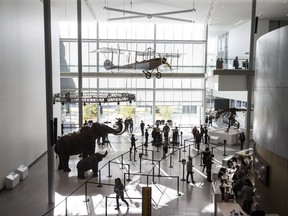 A crowd enters the Royal Alberta Museum on opening day, in Edmonton on Wednesday, Oct. 3, 2018.