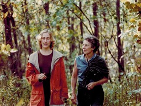 Canadian author Elizabeth Hay walks with her mother, Jean, in an undated photograph.