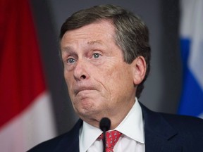 City of Toronto Mayor John Tory speaks during a press conference regarding the court's stay of an earlier court ruling, returning Toronto's election to a 25-ward race, in Toronto on September 19, 2018.