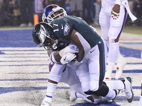 Philadelphia Eagles wide receiver Alshon Jeffery (17) catches a pass for a touchdown during the first half of the team's NFL football game against the New York Giants on Thursday, Oct. 11, 2018, in East Rutherford, N.J.