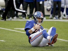 New York Giants quarterback Eli Manning (10) gets up off the turf after being sacked by the Washington Redskins during the second quarter of an NFL football game, Sunday, Oct. 28, 2018, in East Rutherford, N.J.