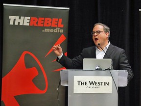Ezra Levant speaks at an anti-carbon tax rally in Calgary on December 11, 2016.