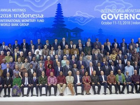 International Monetary Fund (IMF) governors gather for a group photo during the IMF and World Bank meetings in Bali, Indonesia on Saturday, Oct. 13, 2018.