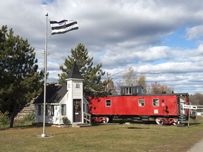 A flag, approved by the village council, flies in Chipman, N.B. on Monday, Oct. 22, 2018. The banner which has been referred to as a "straight flag" has drawn criticism from some residents who say it is harmful to members of the LGBTQ community.