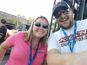 In this Sept, 2, 2017 photo provided by Sean Streeter, he takes a selfie with Tiffany Dunning, left, at the Pepsi Gulf Coast Jam in Panama City Beach, Fla. Even though their radio station has shut down, the radio hosts are keeping Florida Panhandle residents informed on their Facebook page about where to find food, ice and medicine in the wake of Hurricane Michael's destruction.
