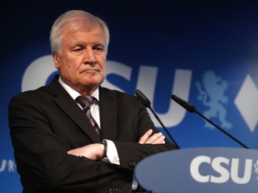 German Interior Minister and CSU chairman Horst Seehofer attends a press conference at the headquarters of the Christian Social Union, CSU, in Munich, Germany, Monday, Oct. 15, 2018, the day after their party lost the absolute majority in Bavaria's state parliament by a wide margin.