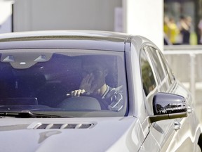 Juventus' Cristiano Ronaldo drives his car as he leaves after completing a training session at the Juventus center in Turin, Italy, Thursday, Oct. 4, 2018. Lawyers for a Nevada woman who has accused Cristiano Ronaldo of raping her say a psychiatrist determined she suffers post-traumatic stress and depression because of the alleged 2009 attack in Las Vegas.