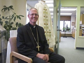 Catholic Archbishop Paul Etienne is shown Wednesday, Oct. 24, 2018, at his office in Anchorage, Alaska. Etienne said the Anchorage Archdiocese has ordered an independent review of sexual abuse claims by reviewing the files of priests and others associated with the archdiocese since it was established in 1966.