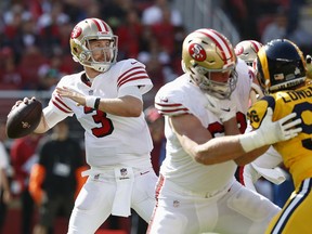 San Francisco 49ers quarterback C.J. Beathard (3) passes against the Los Angeles Rams during the first half of an NFL football game in Santa Clara, Calif., Sunday, Oct. 21, 2018.
