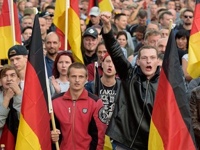Protesters demonstrate in Chemnitz, eastern Germany, on Sept. 7, 2018, after several nationalist groups called for marches to protest the killing of a German man two weeks previous, allegedly by migrants from Syria and Iraq.