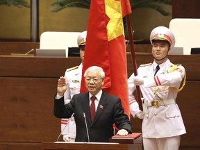 Vietnam's Communist Party General Secretary Nguyen Phu Trong is sworn in as the country's president in Hanoi, Vietnam, Tuesday, Oct. 23, 2018. The 74-year-old Trong was elected president by the National Assembly succeeding thelate President Tran Dai Quang who died last month after battling a viral illness for more than a year.