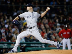 New York Yankees starting pitcher J.A. Happ delivers to the Boston Red Sox in the third inning of a baseball game at Fenway Park, Friday, Sept. 28, 2018, in Boston.