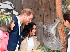 Prince Harry and his wife Meghan meet a koala named Ruby and its koala joey named Meghan after the Duchess of Sussex during a visit to Taronga Zoo in Sydney on Oct. 16, 2018. It was one of the couple's first appearances since announcing they are expecting a baby.