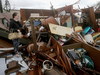 A woman inspects her destroyed home in Panama City, Florida, after Hurricane Michael made landfall in Florida’s Panhandle on Oct. 10, 2018.