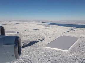 A tabular iceberg floating off of the Larsen C ice shelf.