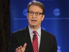 In this July 26, 2018 photo, Illinois 6th District Rep. Peter Roskam participates in a debate with  his Democratic challenger, Sean Casten, right, on July 26, 2018 in Chicago. After more than a decade representing a reliably Republican suburban Chicago district, Rep. Roskam is suddenly among the most endangered House Republicans seeking re-election.
