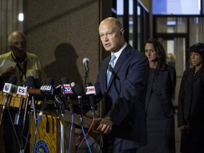 Special Prosecutor Joe McMahon speaks to reporters at the Leighton Criminal Courthouse, Friday, Oct. 5, 2018, in Chicago, after jury found white Chicago police Officer Jason Van Dyke guilty of second-degree murder and aggravated battery in the 2014 shooting of black teenager Laquan McDonald.