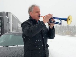 Jens Lindemann, a world-renowned, Grammy and Juno winning trumpeter, entertained motorists stranded on Highway 1 east of Canmore during a record-breaking snowstorm.