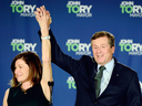 John Tory and wife Barbara Hackett acknowledge supporters after he was re-elected as Toronto mayor on Monday, Oct. 22, 2018.