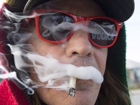 Bill Semeniuk, 67, smokes cannabis in Kamloops, B.C. Wednesday, Oct. 17, 2018.