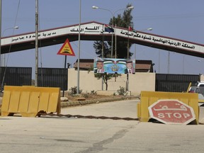 A Syrian-Jordanian border crossing that was closed for more than three years after a takeover of the Syrian side by rebels is shown in this Saturday, Sept. 29, 2018 photo.