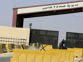A Syrian-Jordanian border crossing that was closed for more than three years after a takeover of the Syrian side by rebels is shown in this Saturday, Sept. 29, 2018 photo. Syria's government says preparations for reopening the crossing completed and that the passage, known to Syrians as Naseeb and to Jordanians as Jaber, will reopen in October.