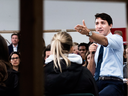 Prime Minister Justin Trudeau makes his case for the new federally-imposed carbon tax to reporters and students at Humber College in Toronto, Oct. 23, 2018.