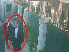 A man identified as Saudi crown prince entourage member Maher Abdulaziz Mutreb walks outside the Saudi consul-general’s residence in Istanbul on Oct. 2, 2018. Journalist Jamal Khashoggi disappeared at the nearby Saudi consulate on the same day.