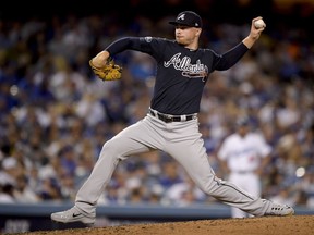 Atlanta Braves pitcher Sean Newcomb throws to a Los Angeles Dodgers batter during the third inning of Game 1 of a baseball National League Division Series on Thursday, Oct. 4, 2018, in Los Angeles.