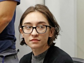 US student Lara Alqasem sits for a hearing at the Tel Aviv district Court on October 11, 2018. - The student was refused entry for alleged support of a pro-Palestinian boycott of goods from Israel has chosen to stay and fight the ban in court. Immigration authority spokeswoman Sabine Haddad told AFP that Lara was being held at an immigration facility but was not under arrest.