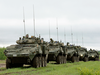 A convoy of Canadian light armoured vehicles during a training exercise.