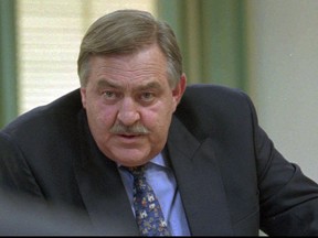 FILE - In this May 15, 1996 file photo, former Foreign Minister Pik Botha attends a news conference in Cape Town, South Africa.  Botha, a fixture on the South African political stage for decades, announced his retirement from politics following his National Party's withdrawel from the unity government. Botha, the last foreign minister of South Africa's apartheid era and a contradictory figure who staunchly defended white minority rule but eventually recognized that change was inevitable, died on Friday, Oct. 12, 2018 at age 86.