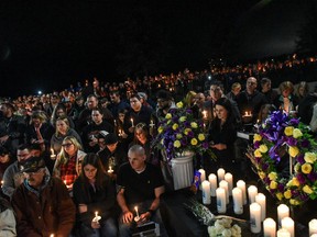 Mourners attend a candlelight vigil for the victims of the fatal limousine crash on October 8, 2018 in Amsterdam, New York. 20 people died in the crash including the driver of the limo, 17 passengers, and two pedestrians.