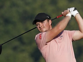 FILE - In this Thursday, Aug. 9, 2018 file photo, Eddie Pepperell, of England, watches his tee shot on the fifth hole during the first round of the PGA Championship golf tournament at Bellerive Country Club, in St. Louis. Eddie Pepperell recorded a hole-in-one on the way to claiming a tie for the lead on 5-under 67 after the first round of the British Masters on Thursday, Oct. 11 while tournament host Justin Rose struggled to a 74.