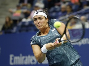 FILE - In this Thursday, Aug. 31, 2017 file photo, Ons Jabeur, of Tunisia, returns a shot to CoCo Vandeweghe, of the United States, during a match at the U.S. Open tennis tournament, in New York. Tunisian qualifier Ons Jabeur became the first player from her country to reach a WTA tennis final on Friday, Oct. 19, 2018 and she will next face Daria Kasatkina for the Kremlin Cup title. Jabeur, the 2011 junior champion at the French Open, beat Anastasija Sevastova 6-3, 3-6, 6-3 in the semifinals.