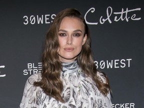 FILE - In this Thursday, Sept. 13, 2018 file photo, Keira Knightley attends a screening of "Colette" at The Museum of Modern Art in New York. A fund set up by British celebrities as part of the Time's Up movement says it has awarded more than 1 million pounds ($1.3 million) to help women who have experienced sexual harassment or abuse. The Justice and Equality Fund was launched earlier this year with backing from stars including Emma Thompson, Gemma Chan, Keira Knightley and Emma Watson.