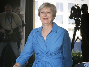 Britain's Prime Minister Theresa May arrives ahead of the annual Conservative Party Conference, in Birmingham, England, Saturday Sept. 29, 2018.  The Conservative Party starts their four-day party conference Sunday Sept 30, but the lack of party unity over Britain's Brexit split from Europe seems set to cause trouble for Prime Minister Theresa May.