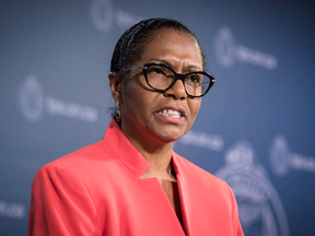 "I am the proof that after 31 long years of suffering, one should never give up," Lyneth Mann-Lewis during a press conference at Toronto police headquarters on Oct. 29, 2018.