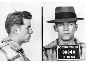 FILE - These 1953 file Boston police booking photos provided by The Boston Globe shows James "Whitey" Bulger after an arrest. Officials with the Federal Bureau of Prisons said Bulger died Tuesday, Oct. 30, 2018, in a West Virginia prison after being sentenced in 2013 in Boston to spend the rest of his life in prison. (Boston Police/The Boston Globe via AP)