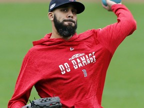 Boston Red Sox pitcher David Price throws a heavy ball during a baseball workout at Fenway Park, Thursday, Oct. 4, 2018, in Boston, in preparation for Game 1 of the ALDS against the New York Yankees on Friday.