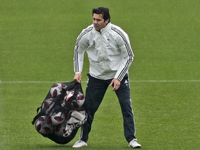 Real Madrid's interim coach Santiago Solari takes part in a training session at the team's Valdebebas training ground in Madrid, Spain, Tuesday, Oct. 30, 2018. Julen Lopetegui was finally fired by Real Madrid on Monday. Santiago Solari, coach of Real Madrid B, will take charge for the Copa del Rey match against third-division club Melilla on Wednesday.